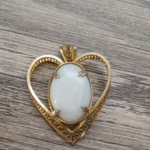 Elegant Gold Heart Pendant with White Stone